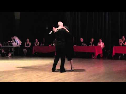  Marek Szotkowski  and  Monica Paz  are  dancing  to  the  milonga  "  La Esquina  "  by  Lucio Demare