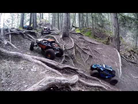 Losi Rock Rey Axial Yeti and Bombers huge air and bash in the forest