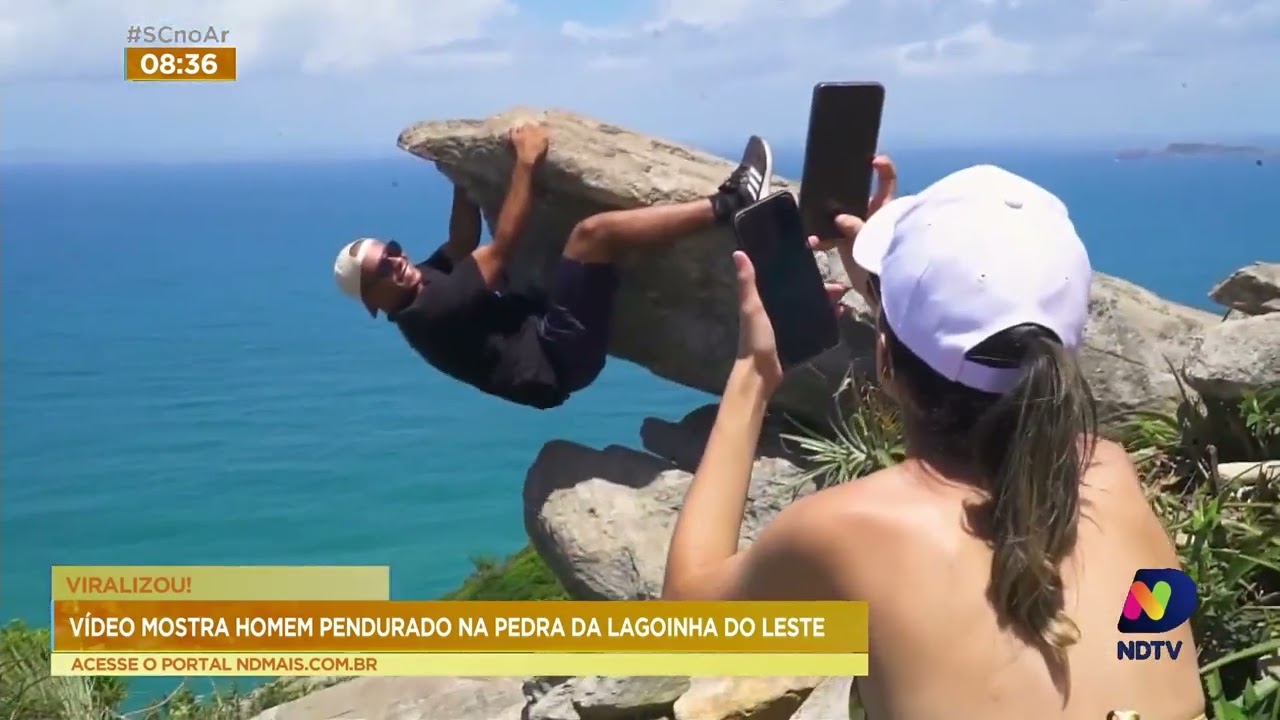 Vídeo mostra homem pendurado na pedra da Lagoinha do Leste