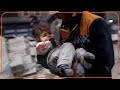WARNING: GRAPHIC CONTENT - Child rescued after massive quake hits Syria and Turkey - Video