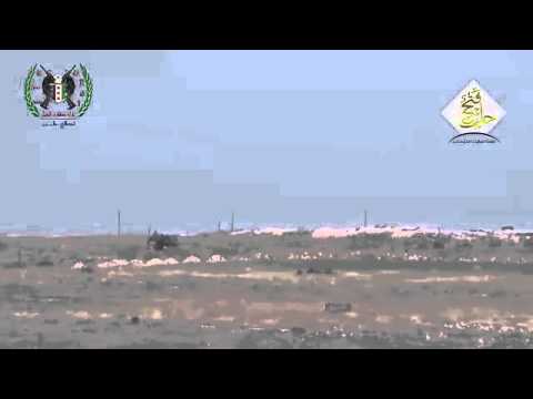 استهداف مدفع ثقيل  اقوات النظام بصاروخ تاو من قبل لواء صقور الجبل في كتيبة الزهراء في محافظة حلب