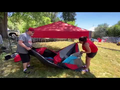 How To set up an Ez Up 6.4 Cube tent system and review.