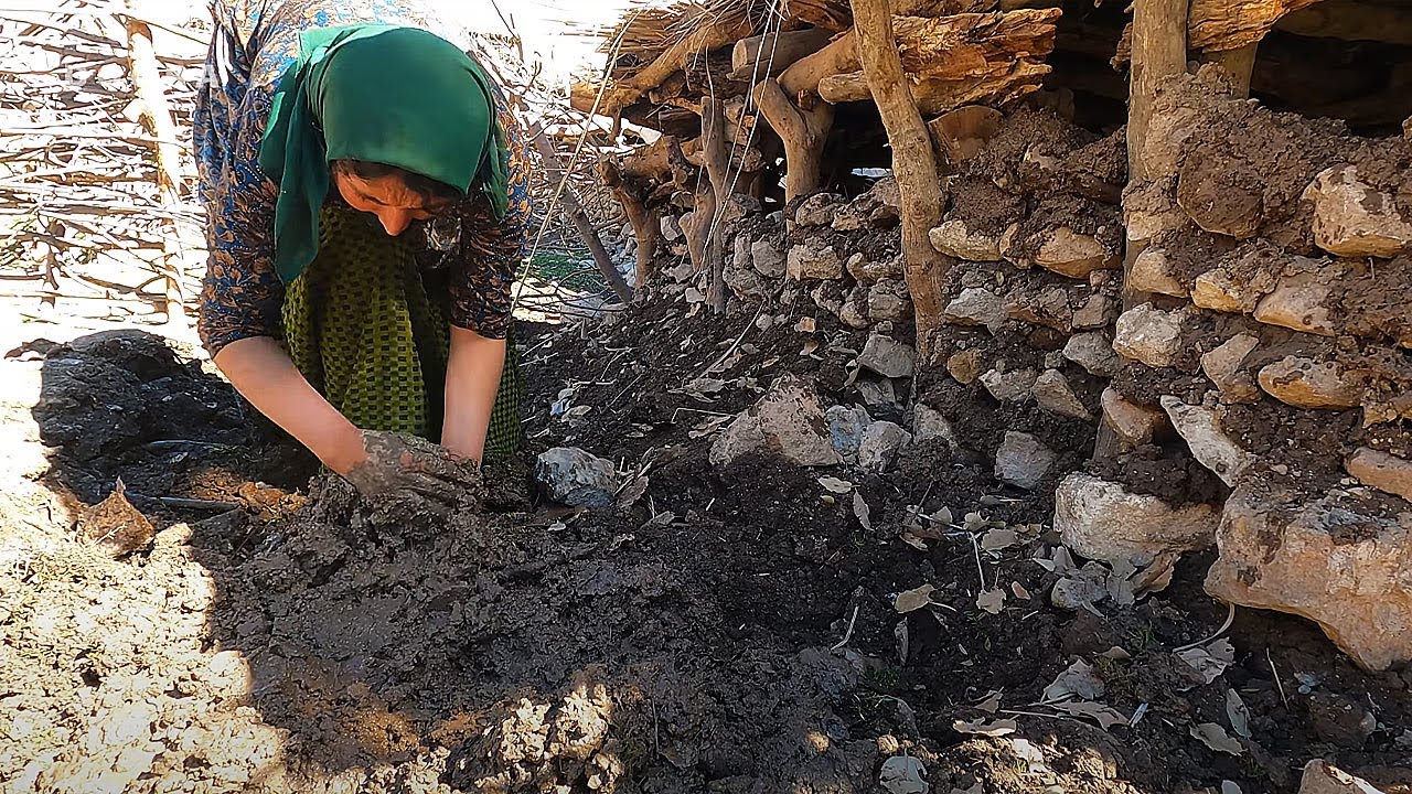 Making corral for sheep by a nomadic woman