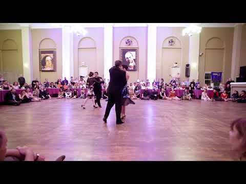  Alejandra Hobert,    Adrian Veredice,    Fabian Salas,    and  Lola Diaz  are  dancing  to  the  tango  "  El Flete  "  by  Juan D'Arienzo  at  Philly Tango Fest  in  2019