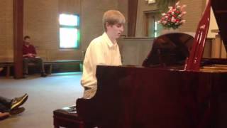 &quot;Turn Back, O Man&quot; by Steven Schwartz, played by Seth Flynn