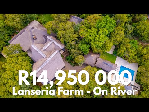 SIGNATURE OFF-GRID LODGE WITH RIVER FRONTAGE AND PANORAMIC MOUNTAIN VIEWS