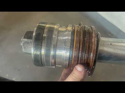 Rebuilding A Hydraulic Cylinder On A John Deere Feller Buncher