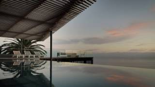 Malibu Hillside pool and terrace frames Pacific Ocean by Michael Goorevich