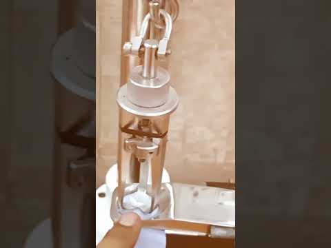 Part of a video titled Button Pull Testing Machine - YouTube