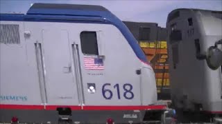 preview picture of video 'Amtrak #6 with Brand New ACS-64 Meets BNSF Coal Train'