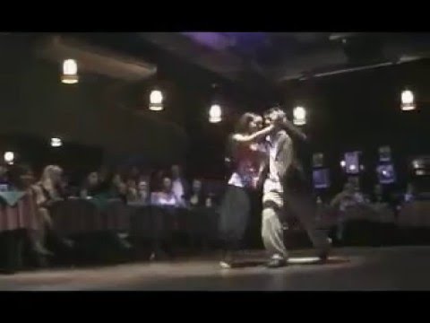  Mariana Dragone  and  Ezequiel Farfaro  are  dancing  to  the  milonga  "  Estampa De Varon  "