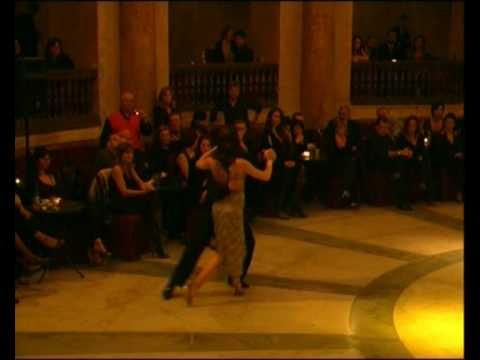  Osvaldo Zotto  and  Mariela Gisele Avanzi  are  dancing  to  the  tango  "  Manana Zarpa Un Barco  "