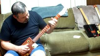 3 string olivia cigar box guitar by Delta Groove Guitars
