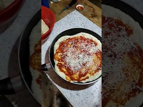 making pizza in a cast iron #alaska #gnomestead