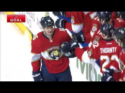 Barkov scores after puck bounces off three skates
