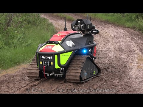 German Firefighting Robot with blue lights - Alpha Robotics Wolf R1 - Rettmobil 2023 expo