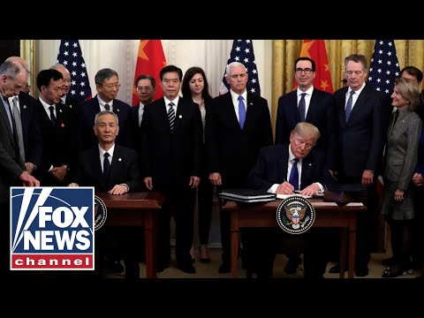 Trump signs 'phase one' of China trade deal Trump signs 'phase one' of China trade deal