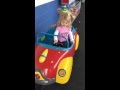 Little Girl Riding Muppet Car Ride