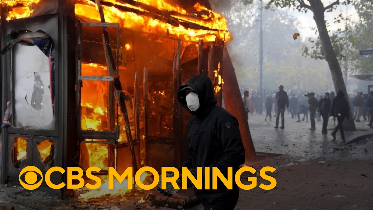 French protests turn violent with looting, torched cars and more