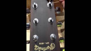 Stringing an acoustic or electric guitar