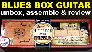 Video thumbnail for Blues Box Guitar, the BBG slide guitar. Unboxing, assembly & review.  cheap cigar box guitar. by GCH Guitar Academy