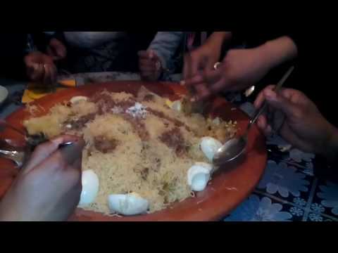 Demonstration of Sunnah tradition of  eating with hands Moroccan-style.