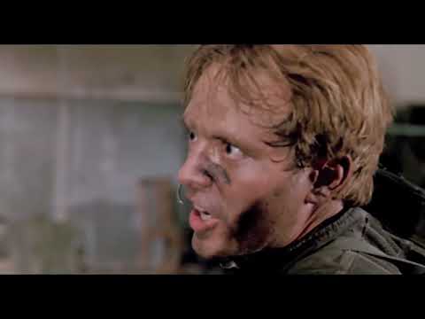 Navy SEALs trailer frame from Beirut firefight sequence, underscored by Sylvester Levay’s tense action cue
