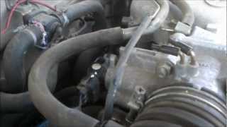 Throttle Position Sensor replacement in a Toyota Tacoma.  TPS install vid.