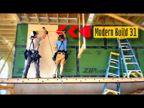 Modern Home Build | 31 | siding panel installation (lower level), porch half wall railings
