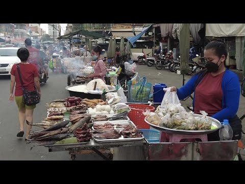 Street food in evening at Olympic Market Phnom Penh Cambodia