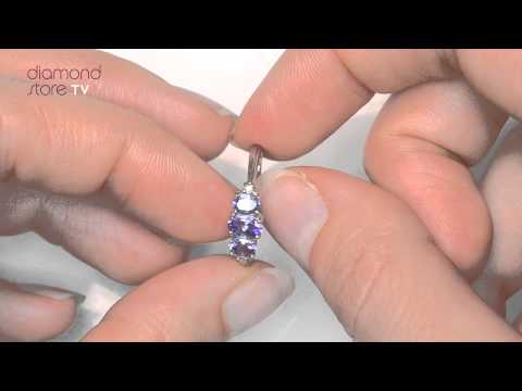 E4861 - Tanzanite 0.59CT And Diamond 9K White Gold Ring