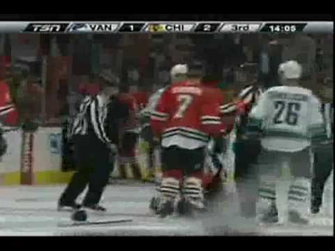 Willie Mitchell Flattens Toews (October 21, 2009)