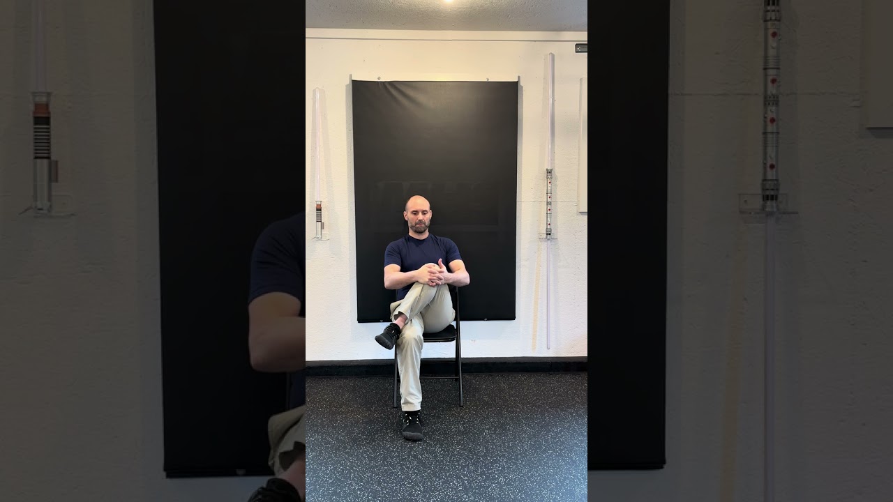 Seated Hip External Rotator Stretch (Front View)