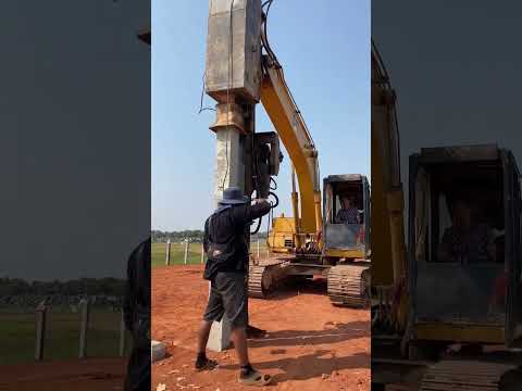 concrete piles drive by excavator
