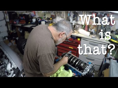 Installing oil pan and rear main seal on the Miata