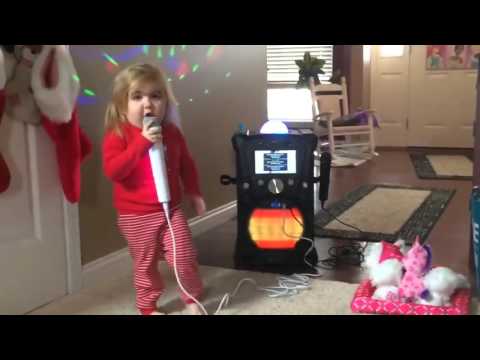 Funny cute girl singing What Makes You Beautiful - One Direction