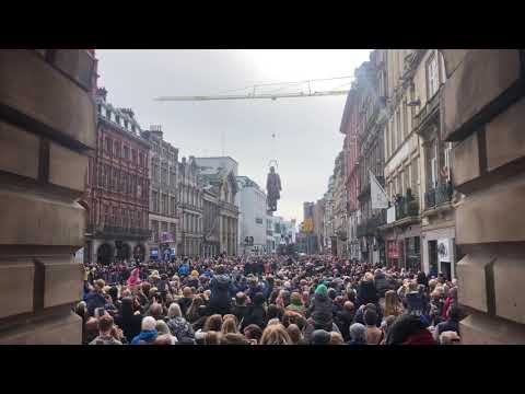 A giant is flying over Castle Street