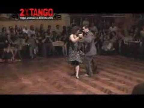  Vilma Fabiana Vega  and  Fernando Galera  are  dancing  to  a  tango