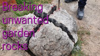 Breaking unwanted garden rocks