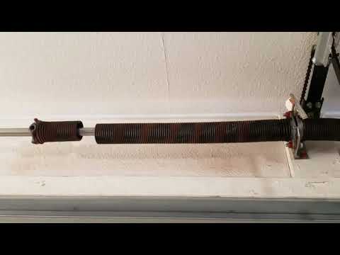 Garage door spring broke on a cold morning? Why winter snaps tired springs