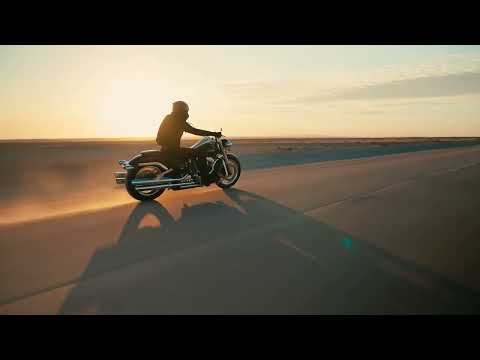Cinematic Low-Angle Motorcycle Speeding on Desert Highway
