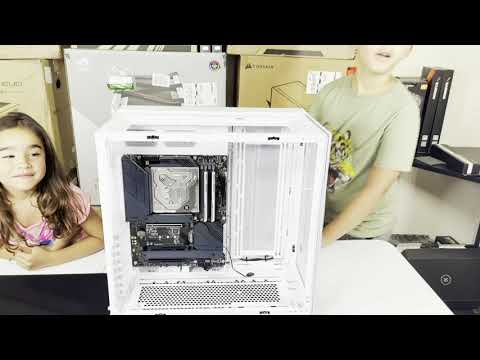 Ryan and Audrey install EKWB motherboard, GPU and Reservoirs into a Lian Li O11 Dynamic EVO PC Case
