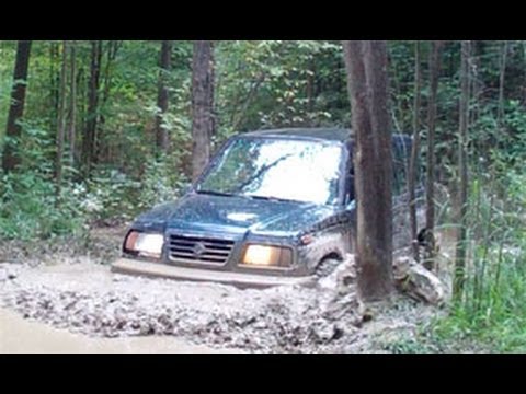 Suzuki Sidekick on muddy trails @ Southington Offroad, OH