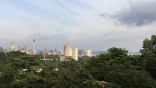 MRT Kuala Lumpur in rain forest & KL city skyline