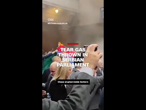 Serbian lawmakers throw tear gas inside parliament