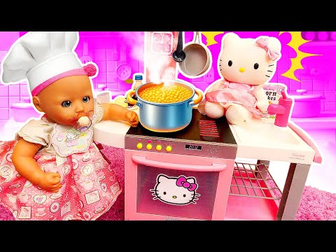 Baby Annabell doll tries a new toy kitchen playset and cook toy food with toy kitty.
