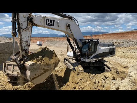 Caterpillar 375 Excavator Loading Trucks With Two Passes