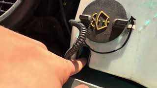 How to Replace a Windshield Washer Pump on a Lincoln Town Car