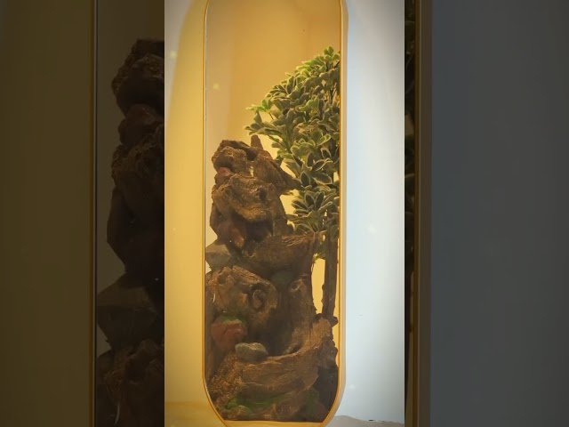 شلال ديكور بتصميم مستوحى من جذع الشجر مع إضاءة ليد...