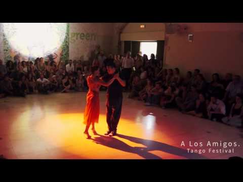  Mariano Frumboli  and  Juana Sepulveda  are  dancing  to  Juan D'Arienzo  at  A los amigos tango festival  in  2015